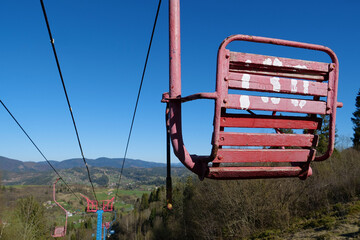 Old non-working chair lift in the mountains