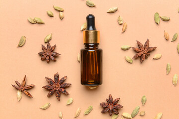 Bottle of essential oil on light background