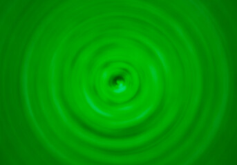 Fondo de remolino en líquido verde.