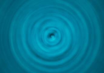 Fondo de remolino en líquido azul.
