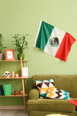 Interior of stylish living room with Mexican flag