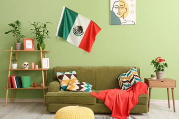 Interior of stylish living room with Mexican flag