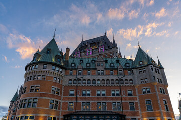 Quebec, Canada - October 20 2021 : Fairmont Le Chateau Frontenac sunset time view. Quebec City Old Town in autumn dusk.