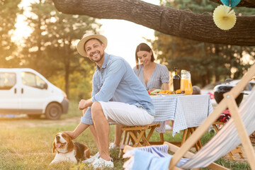 Happy couple at barbecue party on summer day