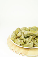 delicious plate of Artichokes with white background for vegan diet 