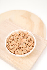 Closeup of textured soy protein. Textured vegetable protein.
Soy meat for a vegan diet