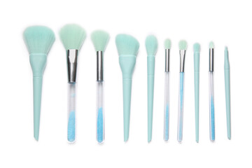 Makeup brushes on white background