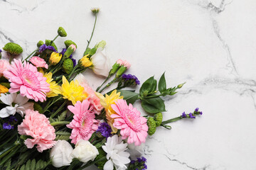 Beautiful flowers on marble background, closeup