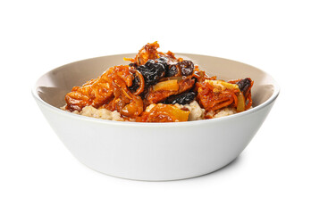 Bowl with delicious oatmeal, gravy with beef and prunes on white background