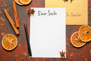 Blank letter to Santa and spices on color background