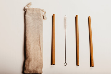 Wooden cocktail rolls with a cloth bag. zero waste, recycling, sustainable lifestyle concept, flat lay