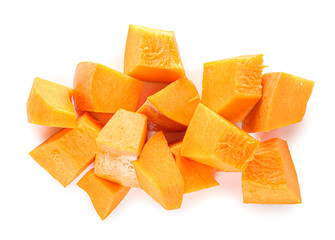 Ripe pumpkin pieces on white background