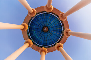 Blue glass transparent dome, bottom view at the evening