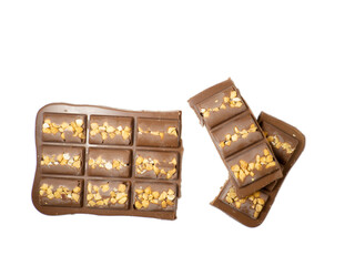 Milk chocolate bar with nuts on a white background.
