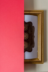 die cut paper card with fancy window opening and with starbursts and red paper