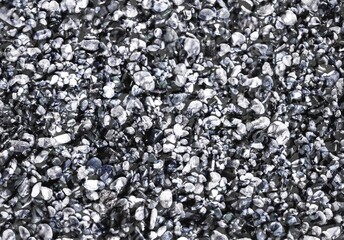 Smooth round pebbles texture background. Pebble beach