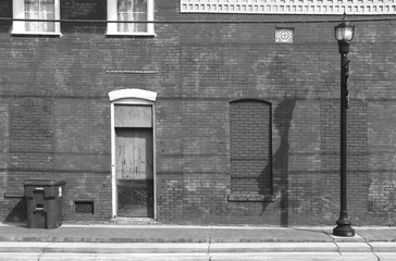 photographic black and white city urban sidewalk brick building style photo