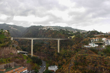 Bridge crosses the mountains in Funchal, Portugal
