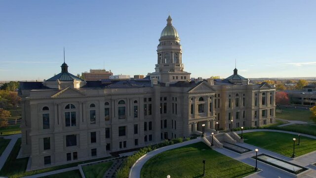 Aerial view of State Capitol Building in Cheyenne, Wyoming. Drone video slowly rising up for high angle view down on the statehouse and surrounding city.