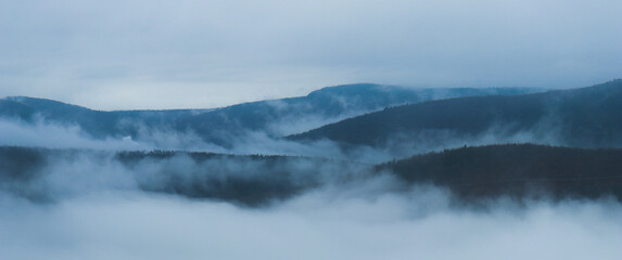 Fog over the mountains wallpaper