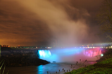 Niagara Falls illuminated at night