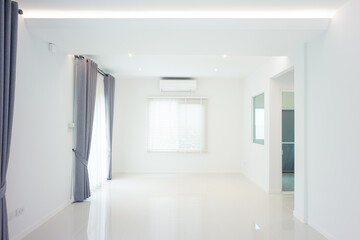 White empty space or room with ceramic tile floor in perspective view, ceiling, curtain, blind, light from door, ceiling strip light and air conditioner. Modern interior home design for background.