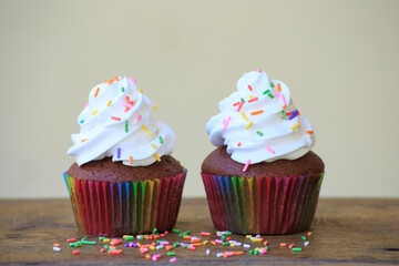 birthday cupcakes on wooden table