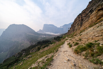 Grinnell Glacier trail in Glacier National Park during hazy, smokey conditions from wildfires