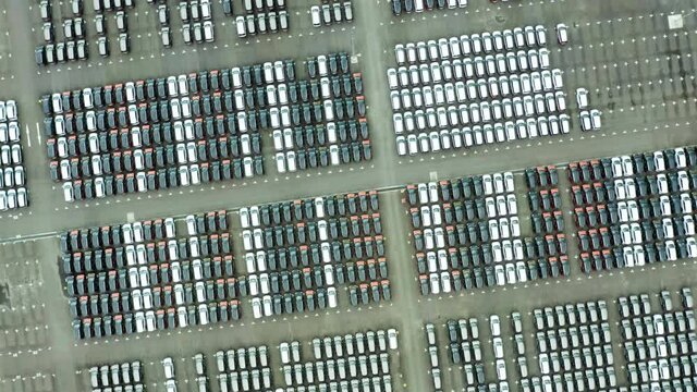 Top down view of new various cars in factory