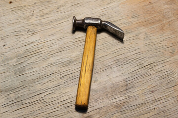 carpentry hammer with wooden handle