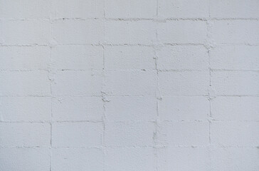 Old painted concrete block wall background. Stylish concrete block texture backdrop.	