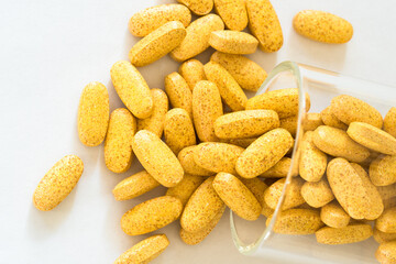 Vitamin B Complex Supplements Spilled from a Jar