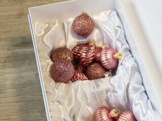 decorations for a Christmas tree in a white box