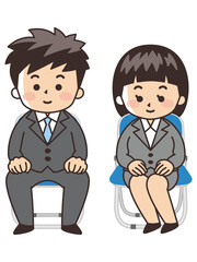 パイプ椅子に座るフレッシュマン　面接