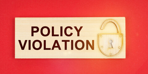 On a red background there is a small plaque on it with a lock and an inscription - Policy Violation