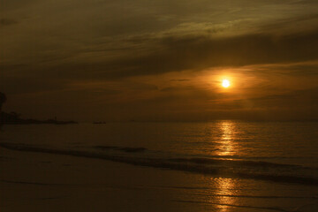 Sunrise at this beach in Thailand Orange skies and beautiful sandy beaches