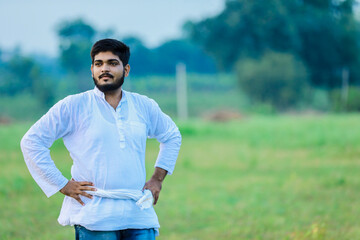 Indian happy farmer in Cotton fild, farmer holding cotton in hand