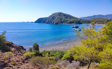 View of the stone beach at the site of the ancient Lycian city of Phaselis. Historic site
