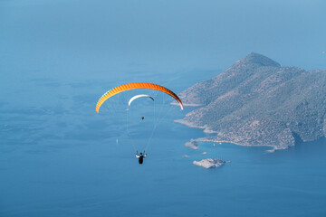 Paragliding parachuting is an extreme and fun sport. Paragliders jumping from Babadag. 21. Ölüdeniz International Air Games. Fethiye – TURKEY