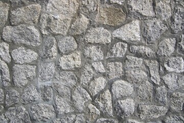 A wave-breaking wall made up of large boulders.