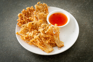 deep fried enoki mushroom or golden needle mushroom with spicy dipping sauce