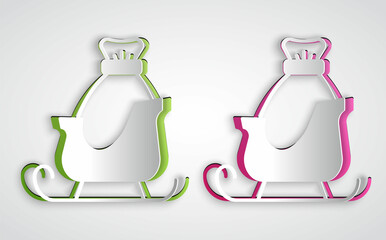 Paper cut Christmas santa claus sleigh with sack bag icon isolated on grey background. Merry Christmas and Happy New Year. Paper art style. Vector
