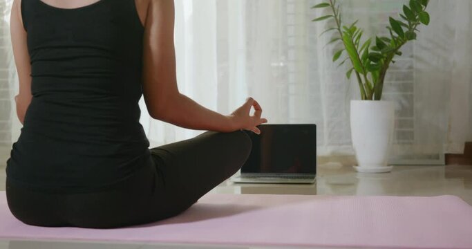 Woman teaching yoga online first step is meditation zen for working out at home in living room fitness, fit sport workout by exercise yoga during covid19 pandemic, Sports healthy lifestyle concept