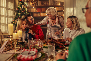 Three generations family gathering for christmas holiday