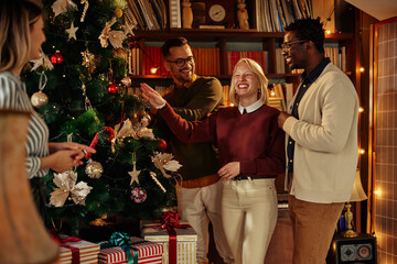 Woman celebrating Christmas with her friends at home