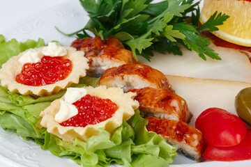 Fototapeta na wymiar Dish with fish snack on white background