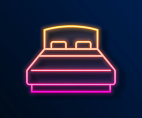 Glowing neon line Big bed for two or one person icon isolated on black background. Vector