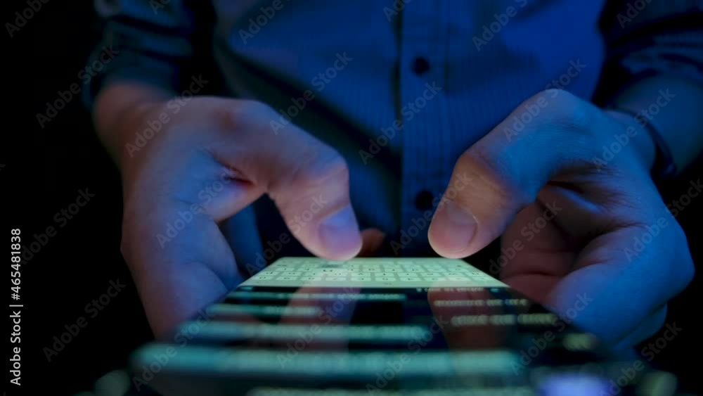 Poster young adult man use smart phone for write send message close up. hold in hand cell phone. concept mo