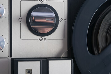 close-up of a retro tape recorder switch with a coil