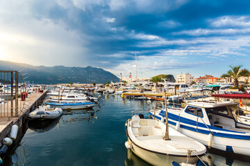 Fototapeta na wymiar Budva marina with boats, beautiful harbour view, Montenegro